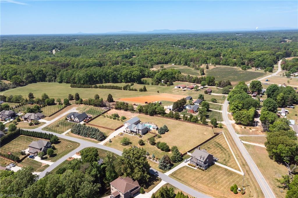 8204 Brotherstwo Road Colfax, NC 27235 - Photo 48 of 50 Aerial view of home and two additional lots