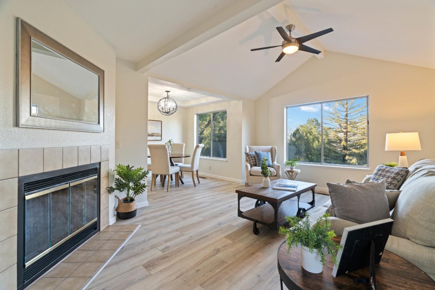 a living room with furniture and a fireplace