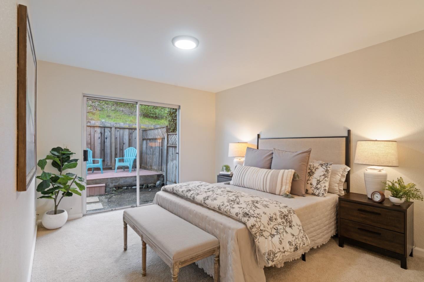 818 Coyote Road San Jose, CA 95111 - Photo 15 of 39 a bedroom with a bed and potted plant