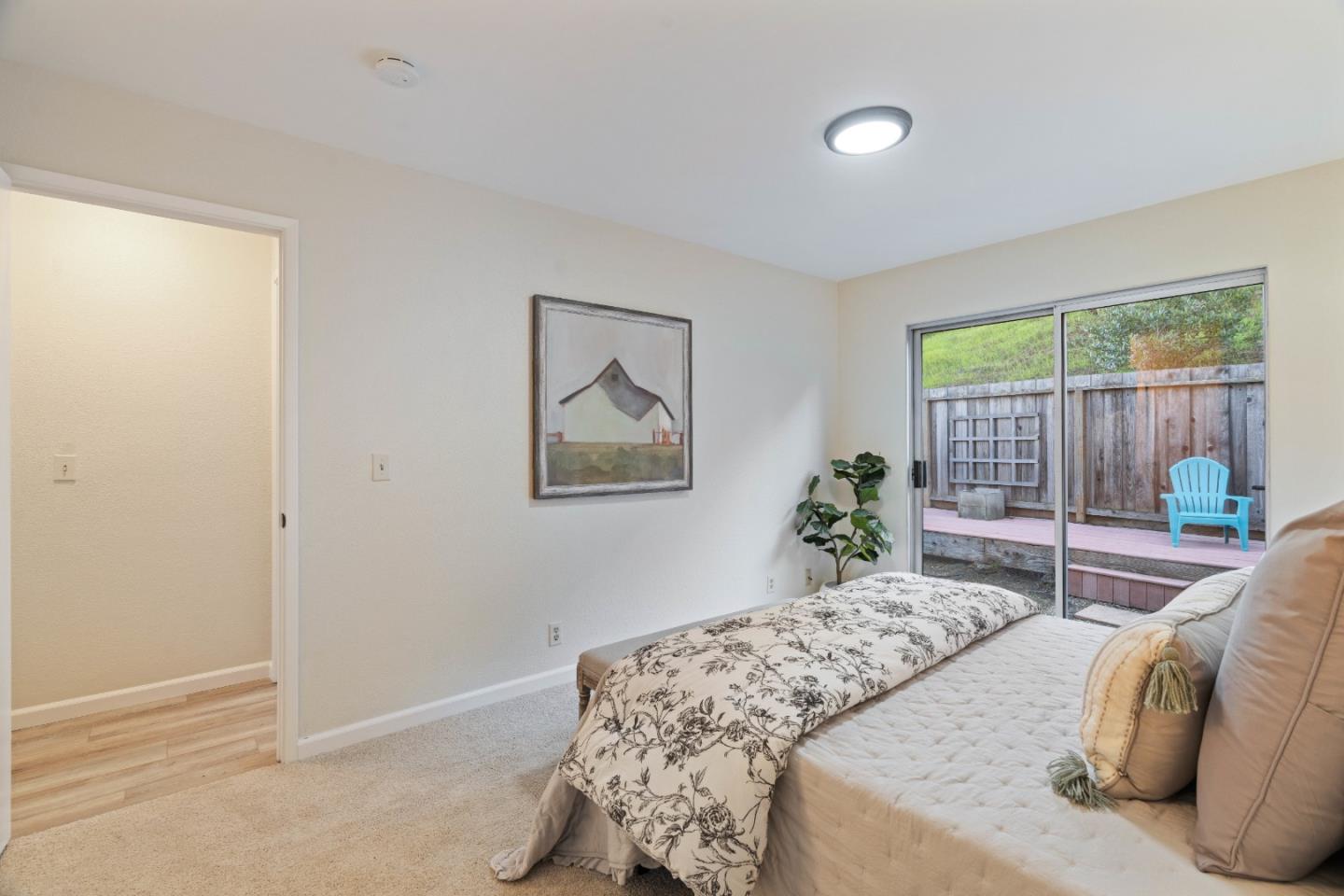 818 Coyote Road San Jose, CA 95111 - Photo 16 of 39 a bedroom with a bed and a large window