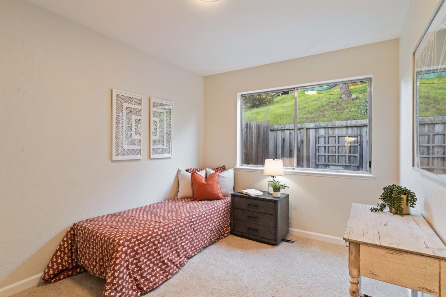 818 Coyote Road San Jose, CA 95111 - Photo 19 of 39 a bedroom with a bed and a window
