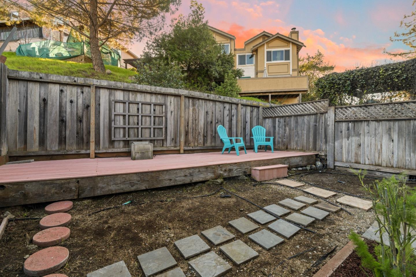 818 Coyote Road San Jose, CA 95111 - Photo 25 of 39 a backyard of a house with table and chairs