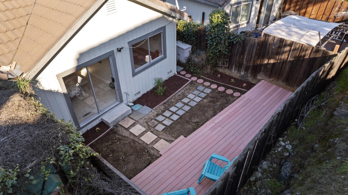 818 Coyote Road San Jose, CA 95111 - Photo 26 of 39 a backyard of a house with lots of green space