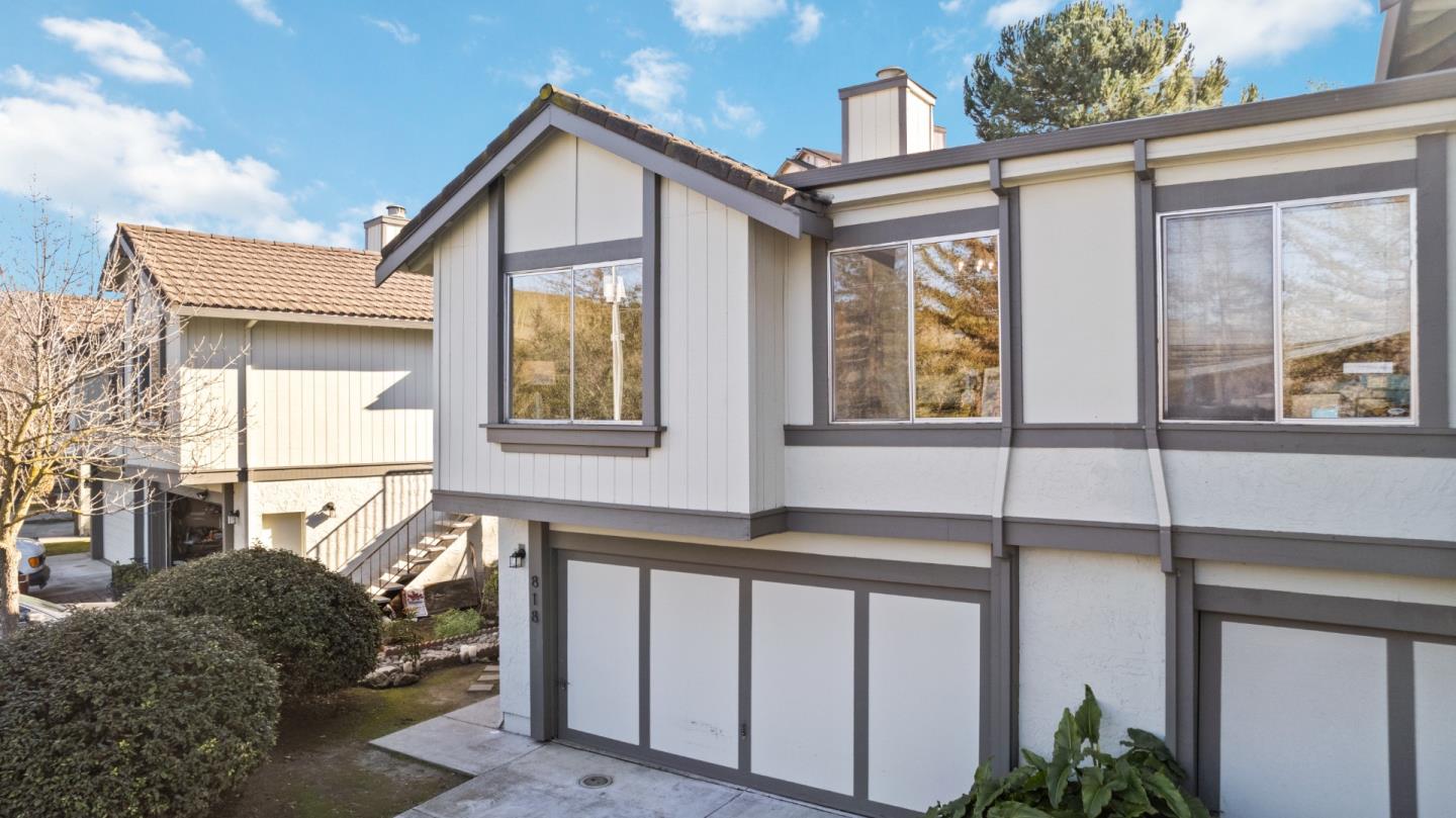 818 Coyote Road San Jose, CA 95111 - Photo 29 of 39 a front view of a house with large windows