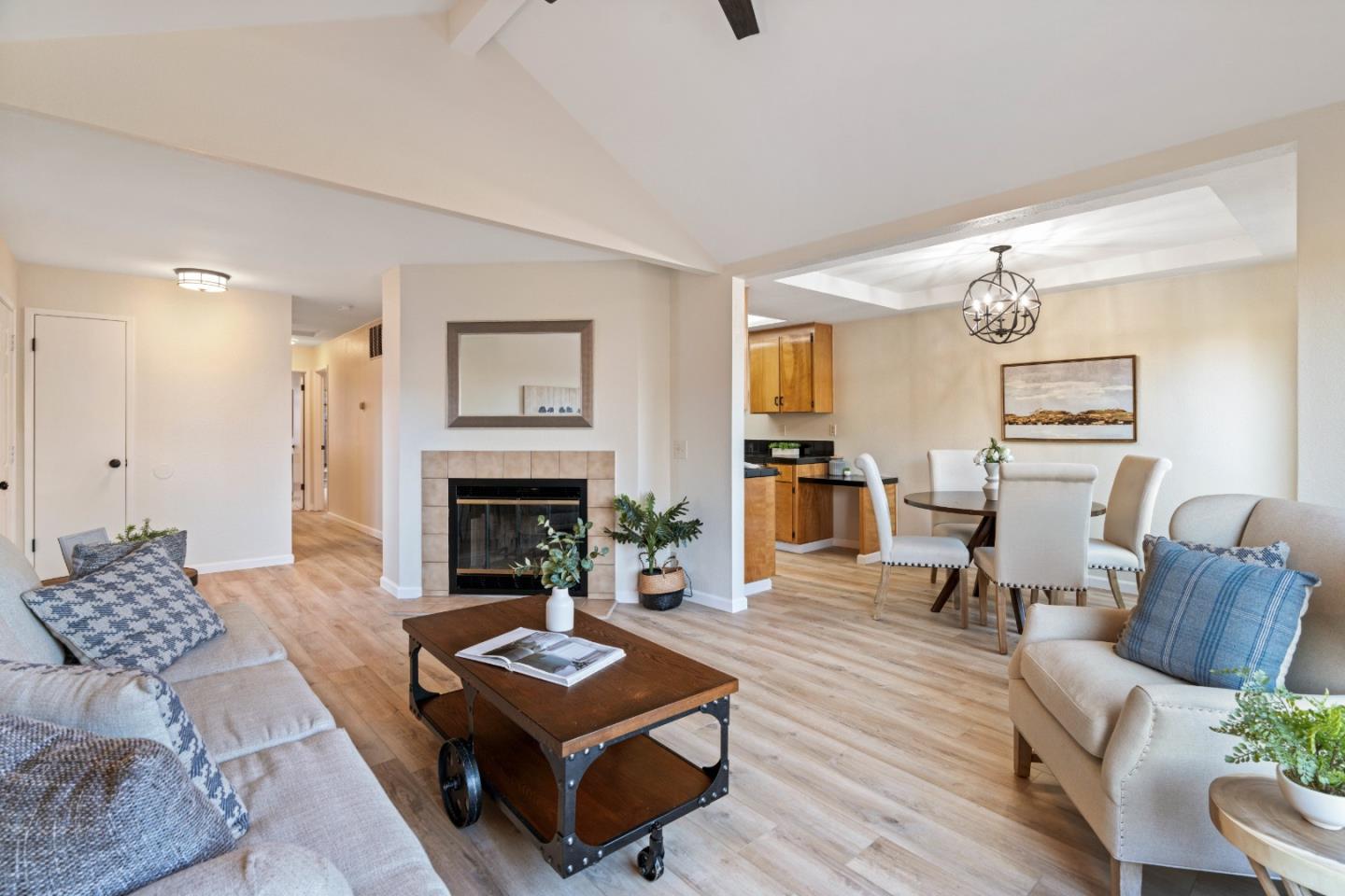 818 Coyote Road San Jose, CA 95111 - Photo 5 of 39 a living room with furniture and a fireplace