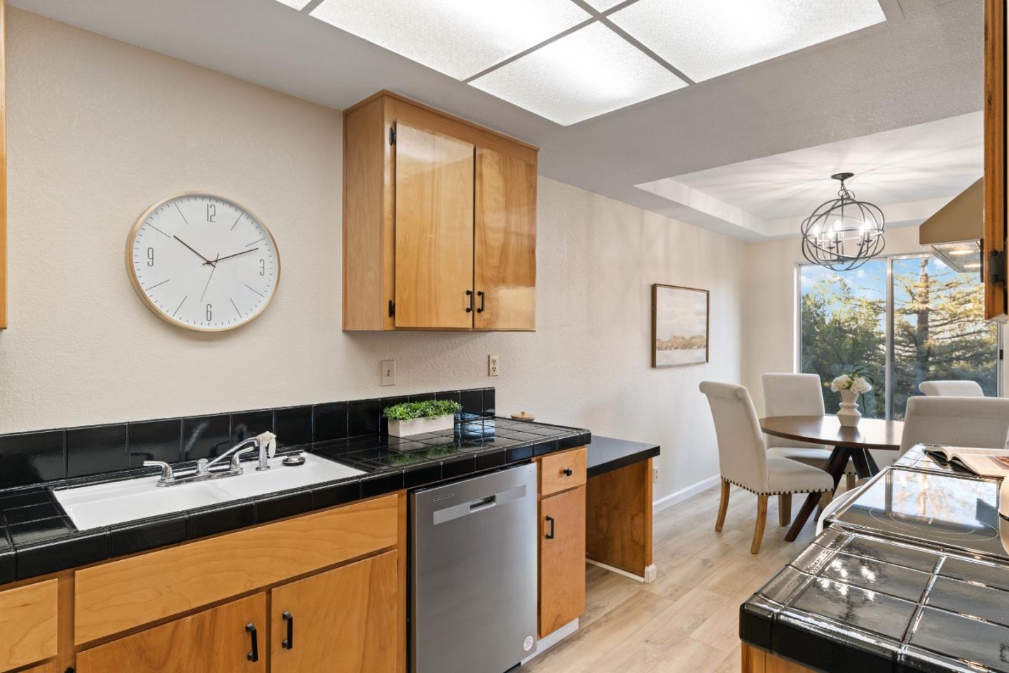 818 Coyote Road San Jose, CA 95111 - Photo 9 of 39 a kitchen with a table and chairs