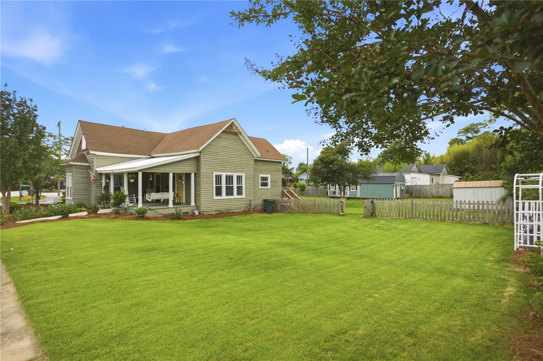 314 South Fairplay Street Seneca, SC 29678 - Photo 6 of 50 This charming home features a broad front porch and a well-maintained lawn.