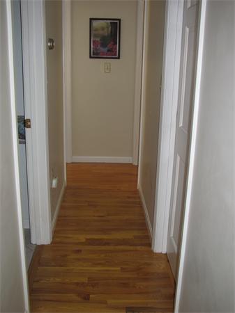 25 Arlington Road Wareham, MA 02571 - Photo 11 of 17 a view of a hallway with wooden floor