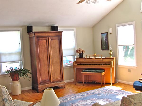 25 Arlington Road Wareham, MA 02571 - Photo 4 of 17 a living room with furniture a window and a fireplace