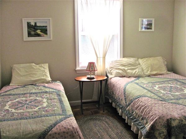 25 Arlington Road Wareham, MA 02571 - Photo 5 of 17 a bedroom with a bed and a window