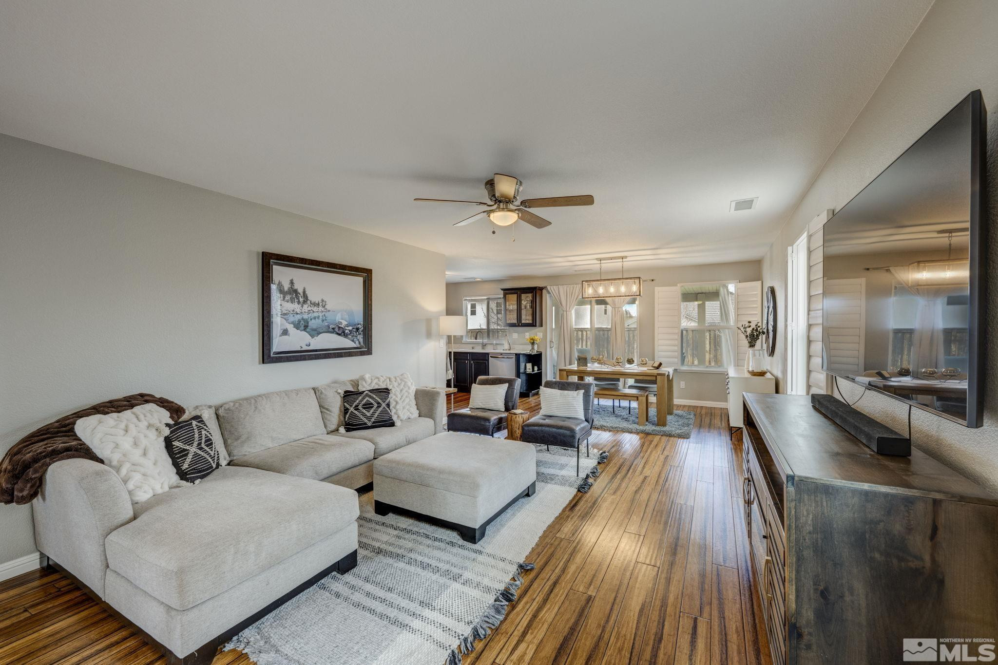 375 Pesaro Way Reno, NV 89521 - Photo 5 of 39 a living room with furniture and a wooden floor