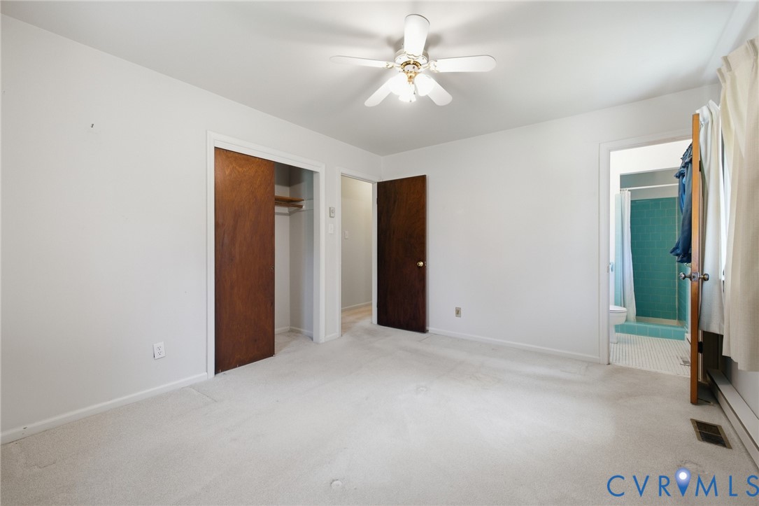 10215 River Road Petersburg, VA 23803 - Photo 22 of 31 Light-toned carpeting, ceiling fan, and a wood-fin