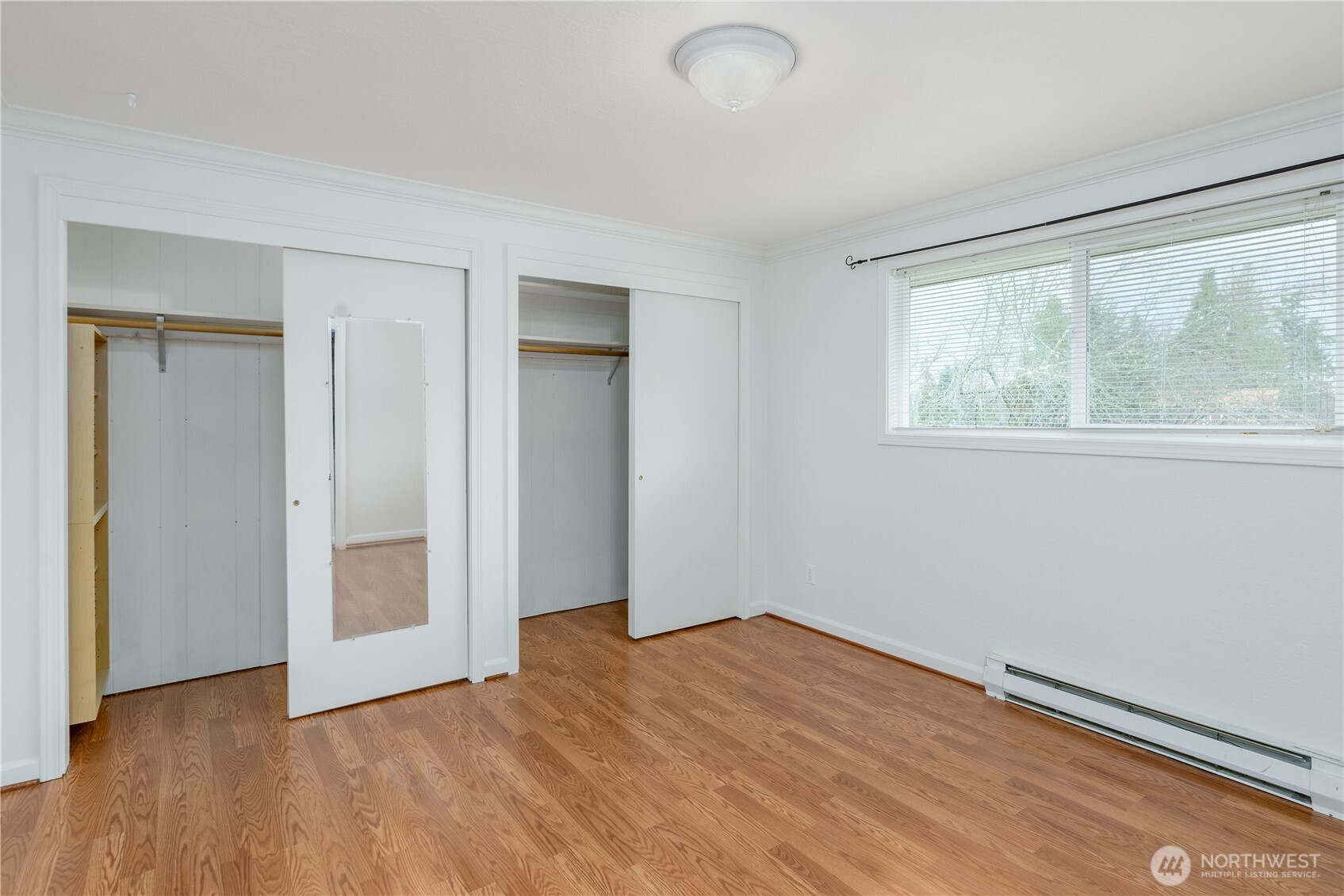 4109 South Reddick Road Port Angeles, WA 98363 - Photo 12 of 38 a view of empty room with wooden floor and fan