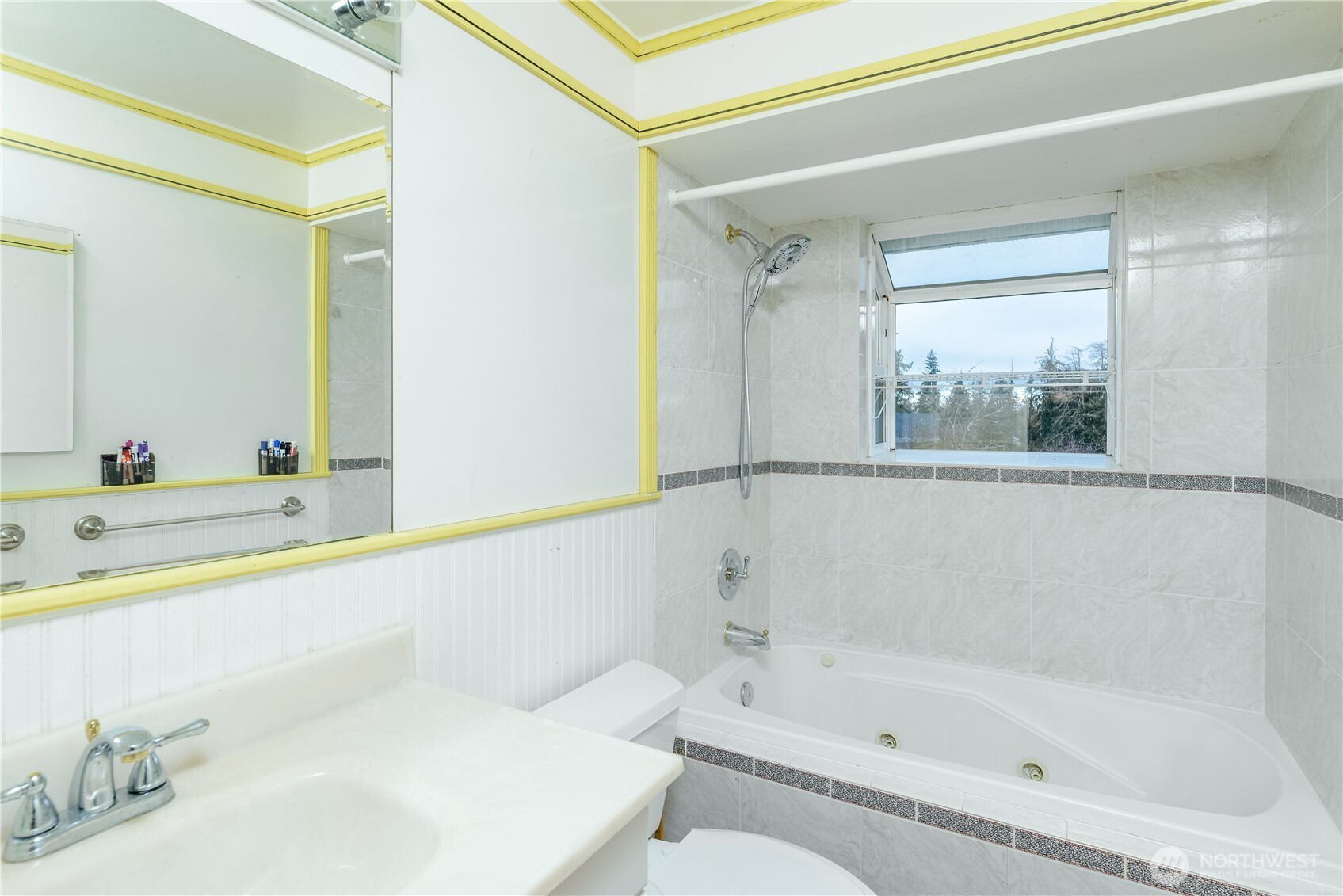 4109 South Reddick Road Port Angeles, WA 98363 - Photo 15 of 38 a bathroom with a bathtub and a shower