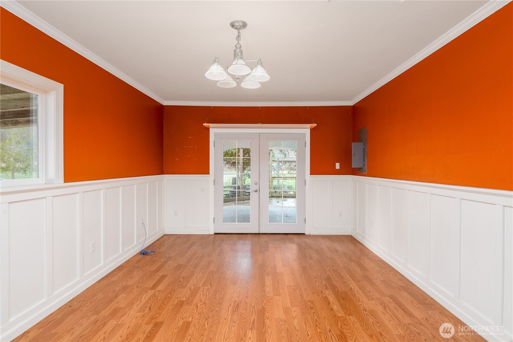 4109 South Reddick Road Port Angeles, WA 98363 - Photo 19 of 38 a view of an empty room with wooden floor and a window