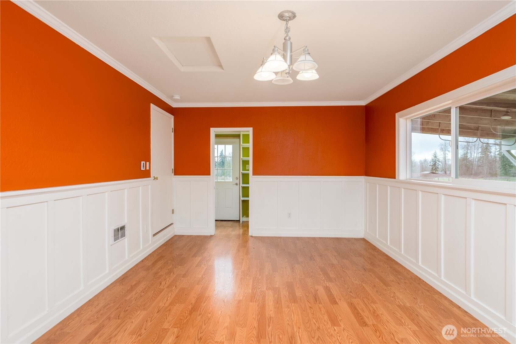 4109 South Reddick Road Port Angeles, WA 98363 - Photo 20 of 38 wooden floor in an empty room with a window