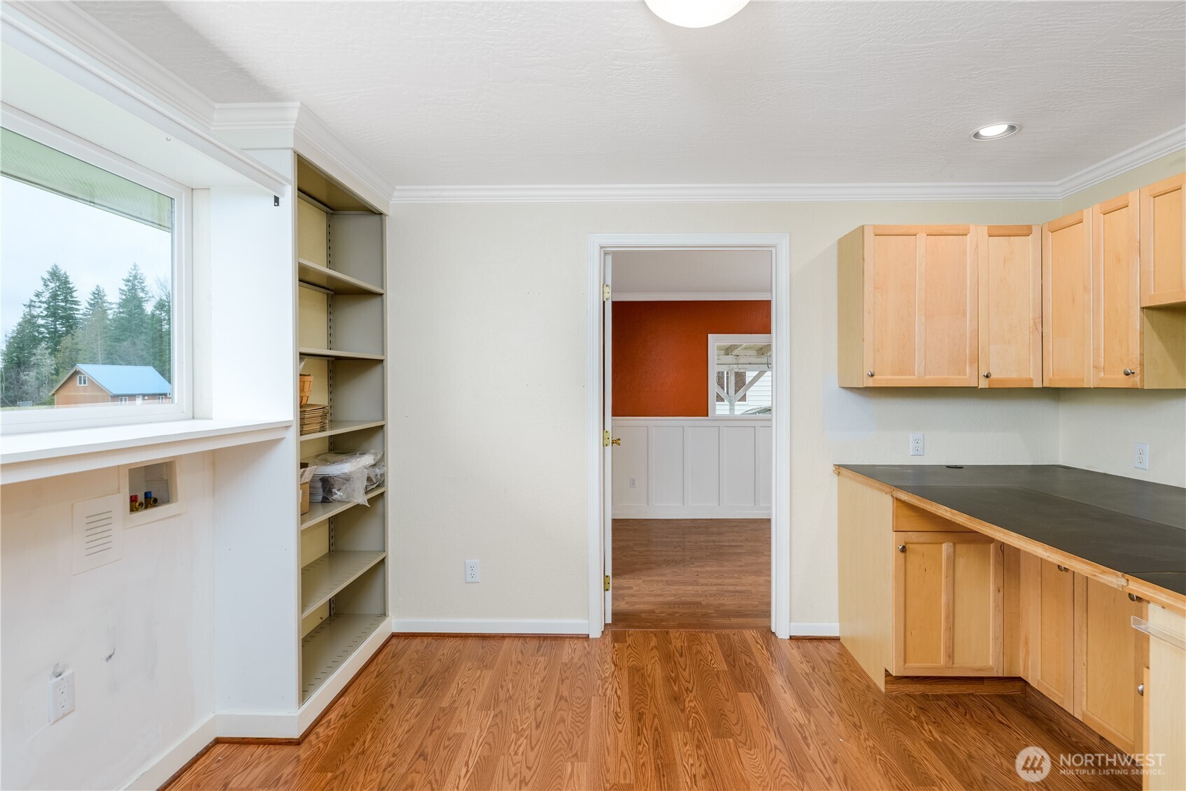 4109 South Reddick Road Port Angeles, WA 98363 - Photo 22 of 38 a view of kitchen with wooden floor and electronic appliances
