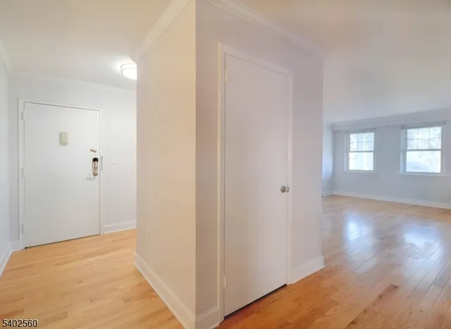 a view of livingroom with hardwood floor and window