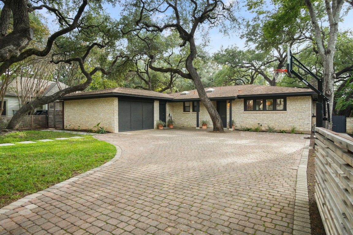2903 Bonnie Road Austin, TX 78703 - Photo 1 of 1 a front view of a house with a garden