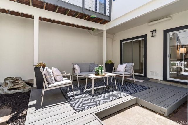 a outdoor living space with patio furniture