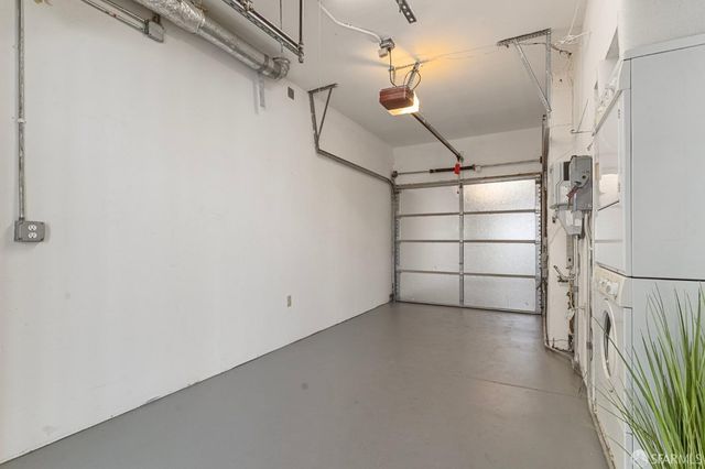 a view of a hallway with windows