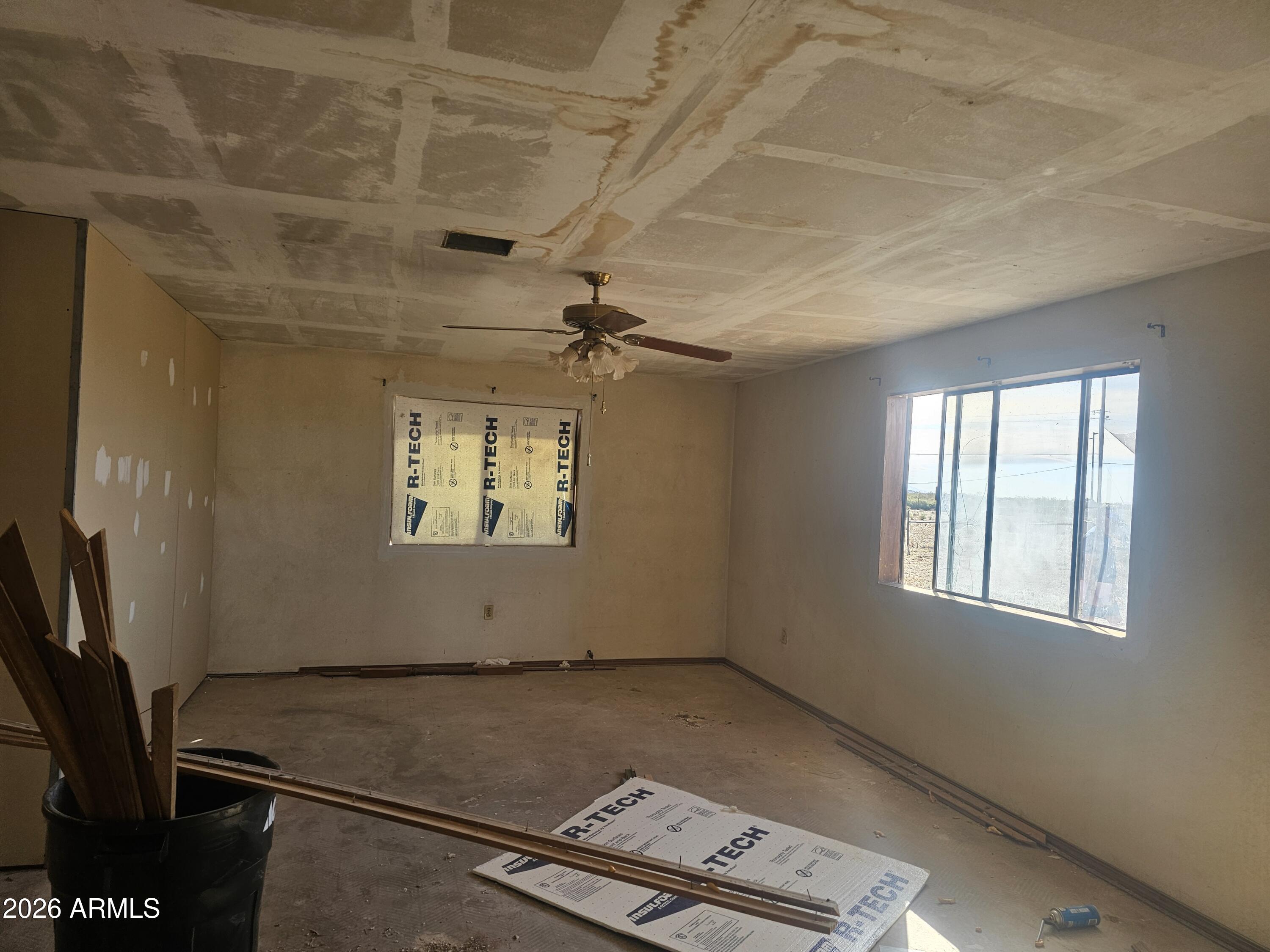 3613 North Papoose Road, Unit 3613 Casa Grande, AZ 85193 - Photo 12 of 19 a view of an empty room with a window