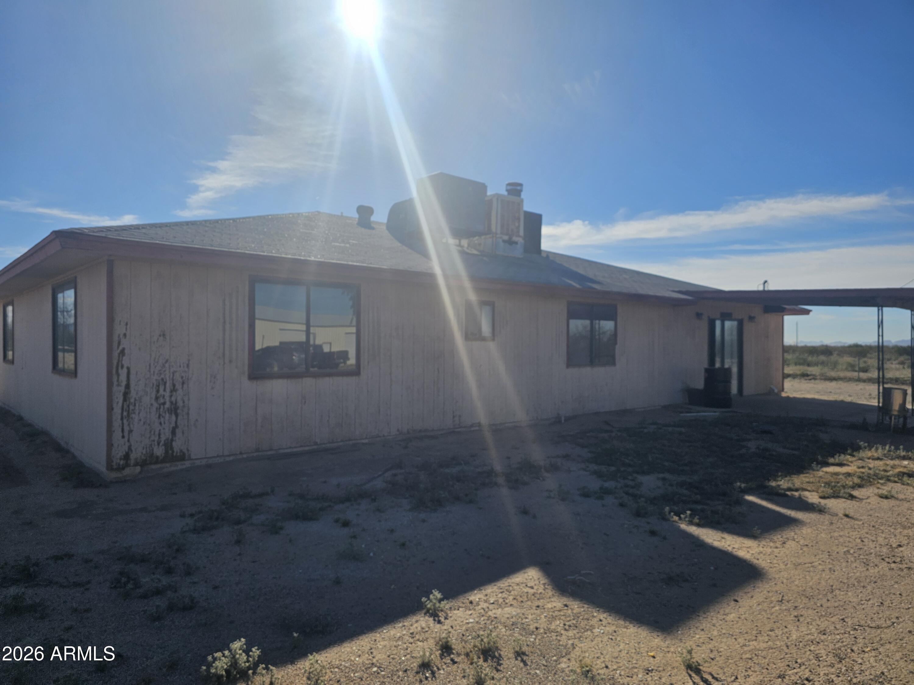 3613 North Papoose Road, Unit 3613 Casa Grande, AZ 85193 - Photo 10 of 19 a view of a house with a yard
