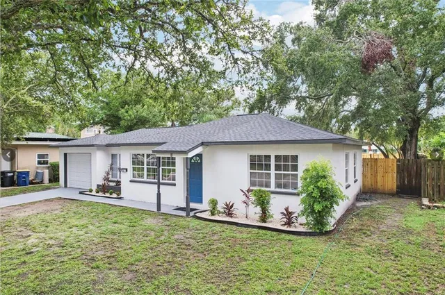 front view of a house with a yard
