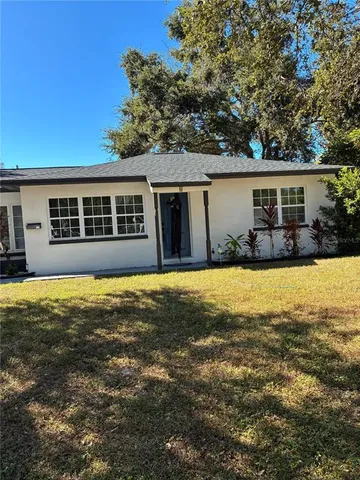 front view of a house with a yard