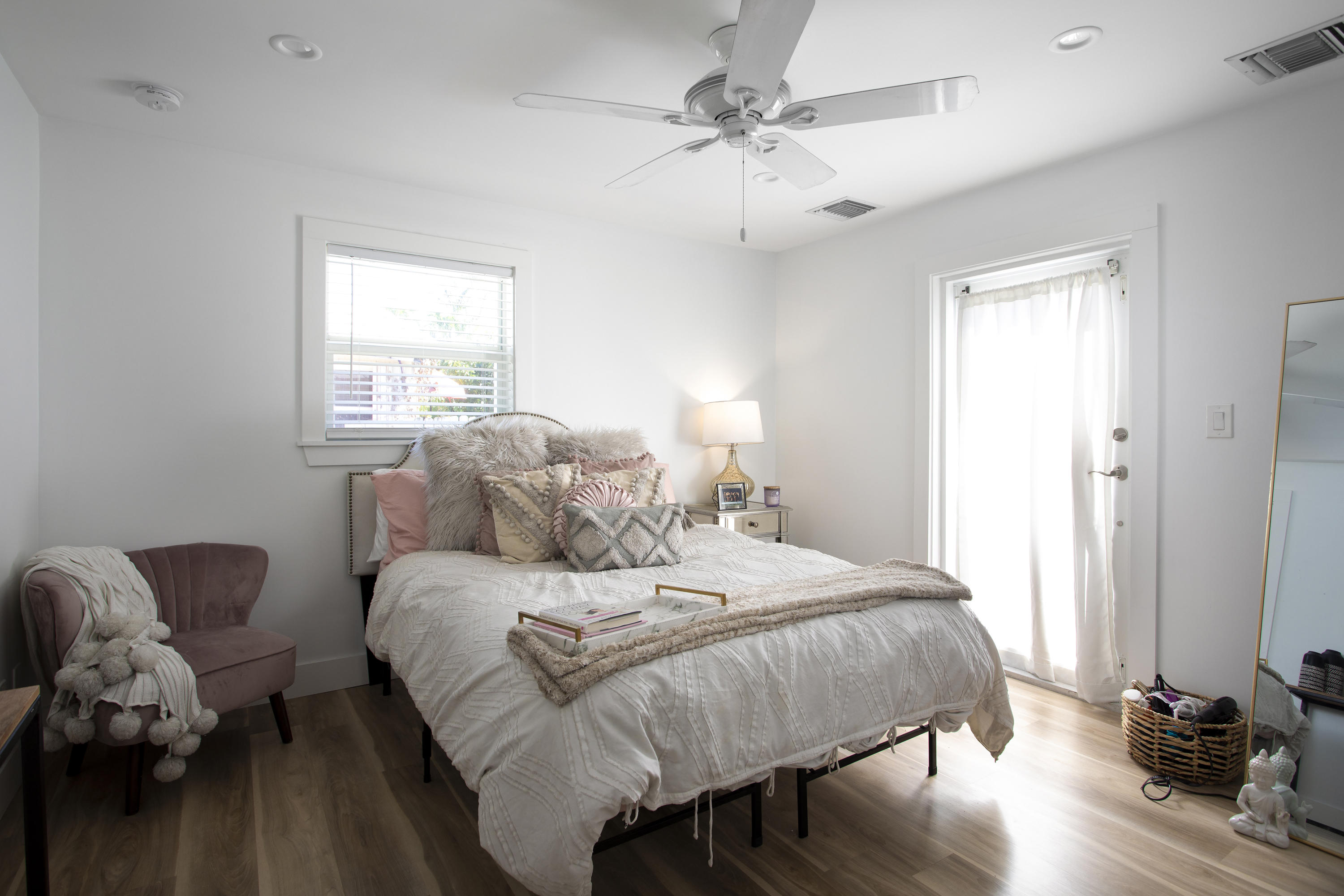 1522 Washington Street Key West, FL 33040 - Photo 11 of 21 a bedroom with a bed and wooden floor