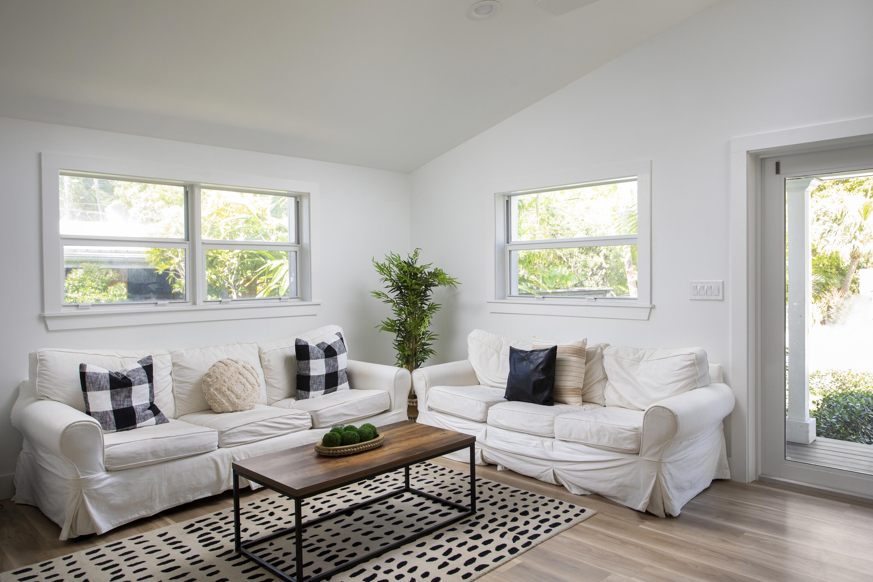 1522 Washington Street Key West, FL 33040 - Photo 4 of 21 a living room with furniture and a large window