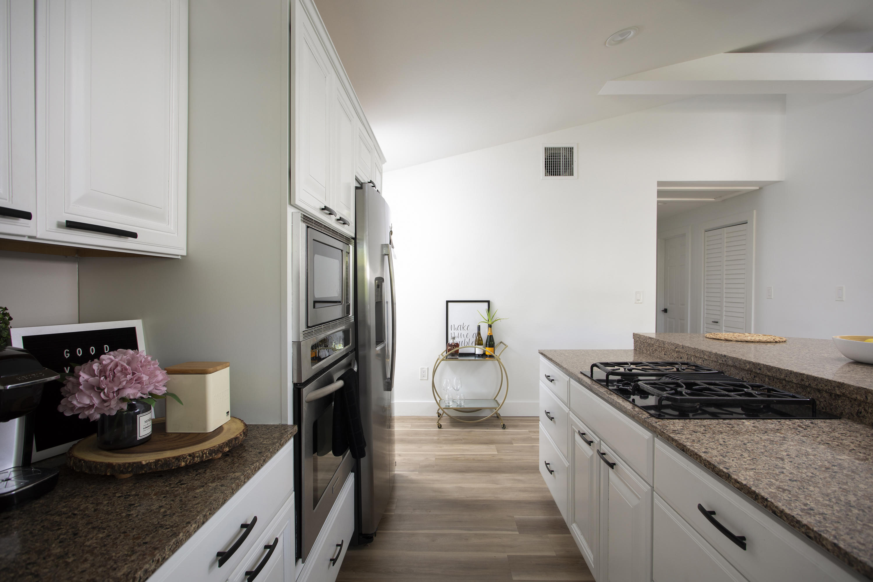 1522 Washington Street Key West, FL 33040 - Photo 7 of 21 a kitchen with a stove and a refrigerator