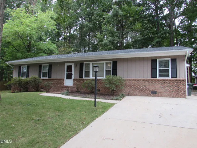 front view of a house and a yard
