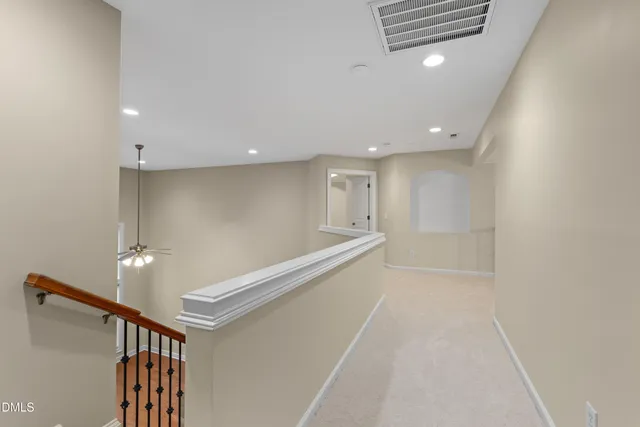 a bathroom with a sink double vanity and a mirror