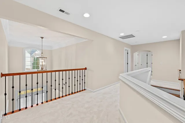 a bathroom with a double vanity sink mirror and shower