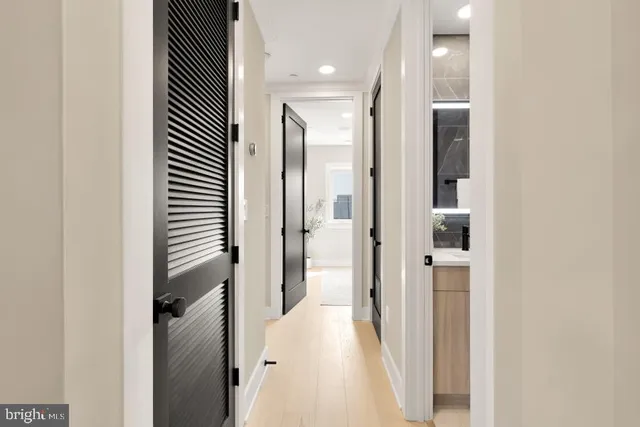 a view of a hallway with a dining room view