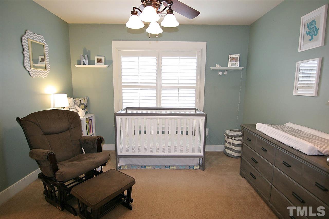 2248 Dunlin Lane Raleigh, NC 27614 - Photo 20 of 24 a living room with furniture and a window