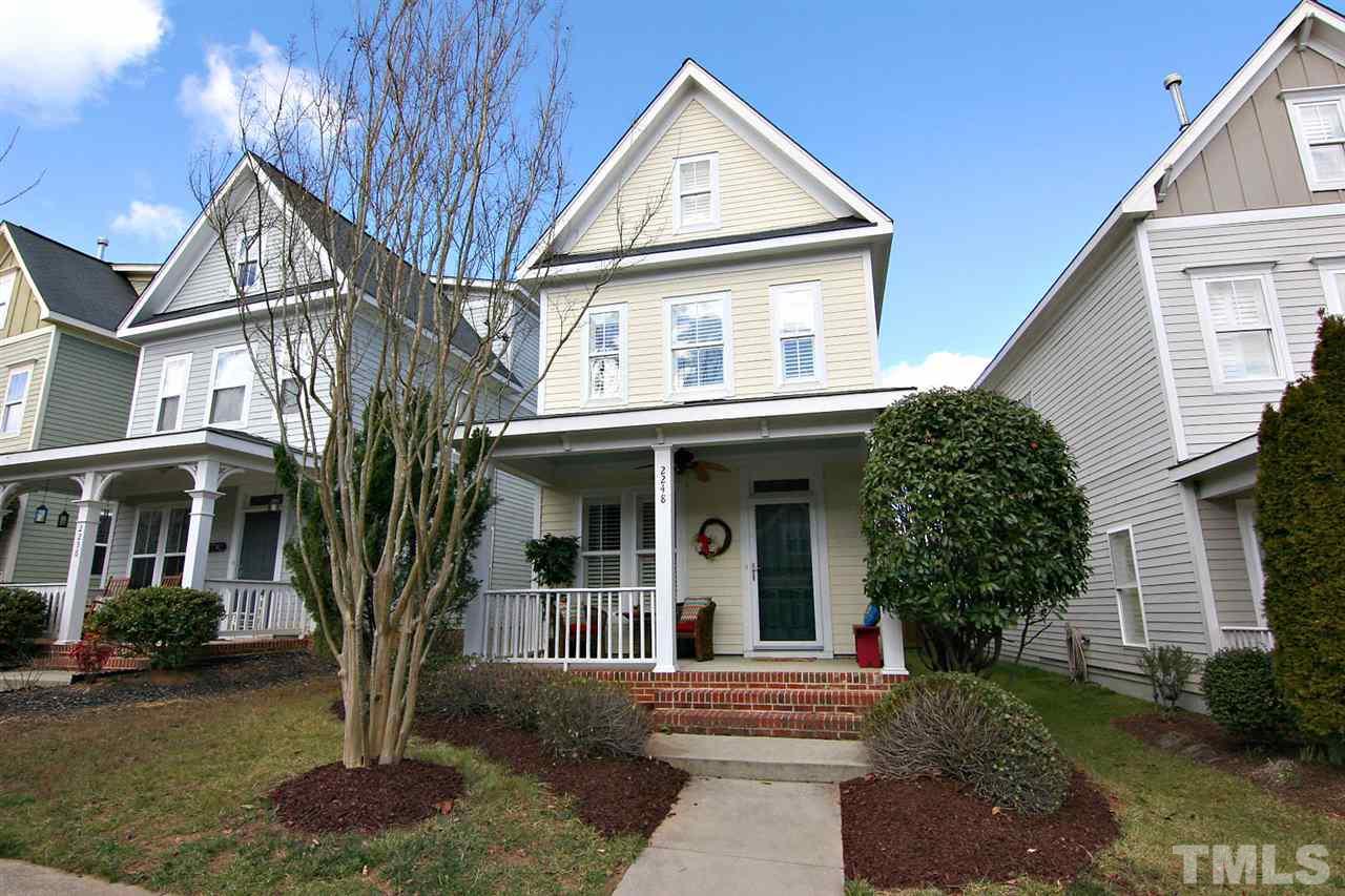 2248 Dunlin Lane Raleigh, NC 27614 - Photo 3 of 24 a view of a white house with a small yard and large tree