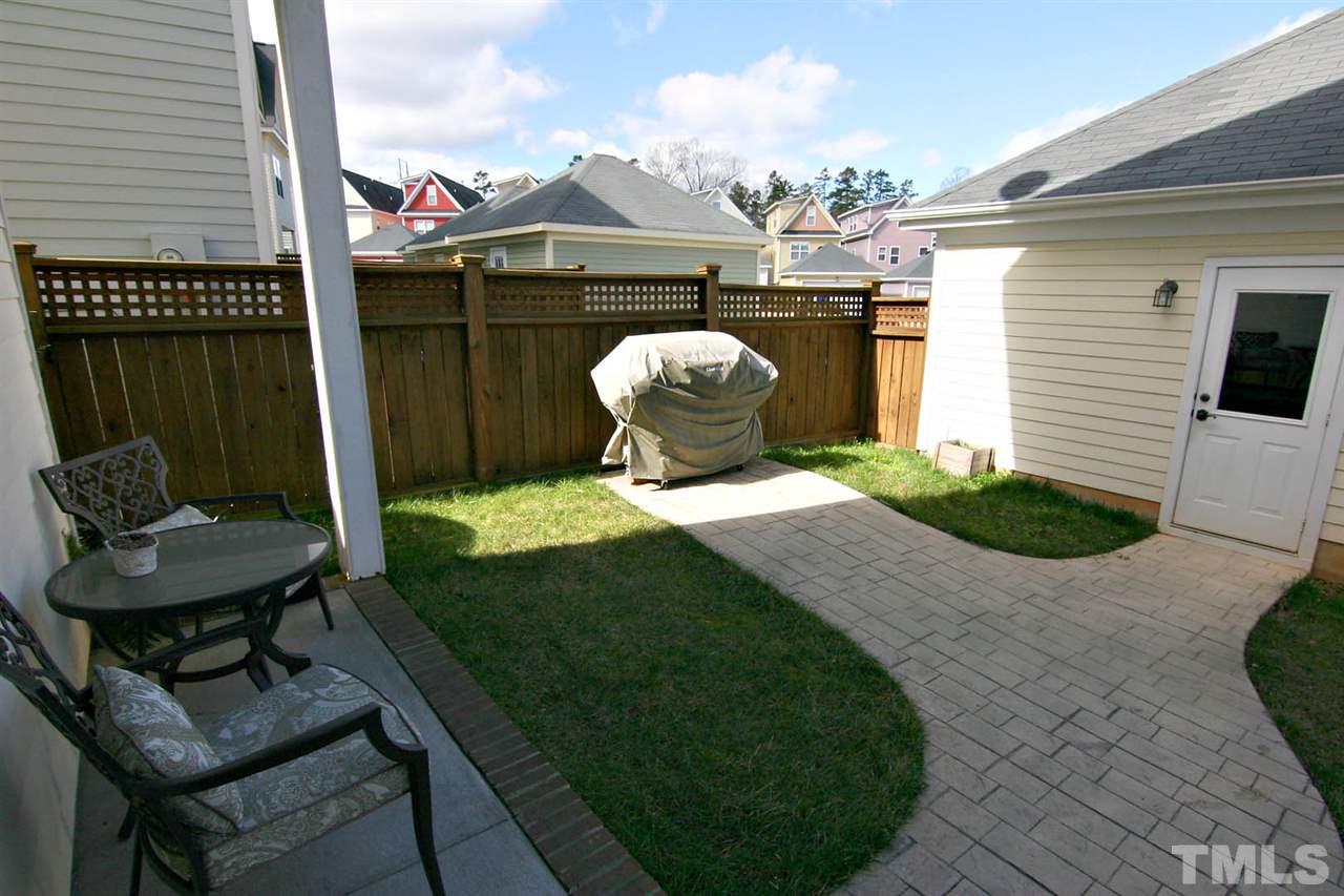 2248 Dunlin Lane Raleigh, NC 27614 - Photo 22 of 24 a patio with table and chairs