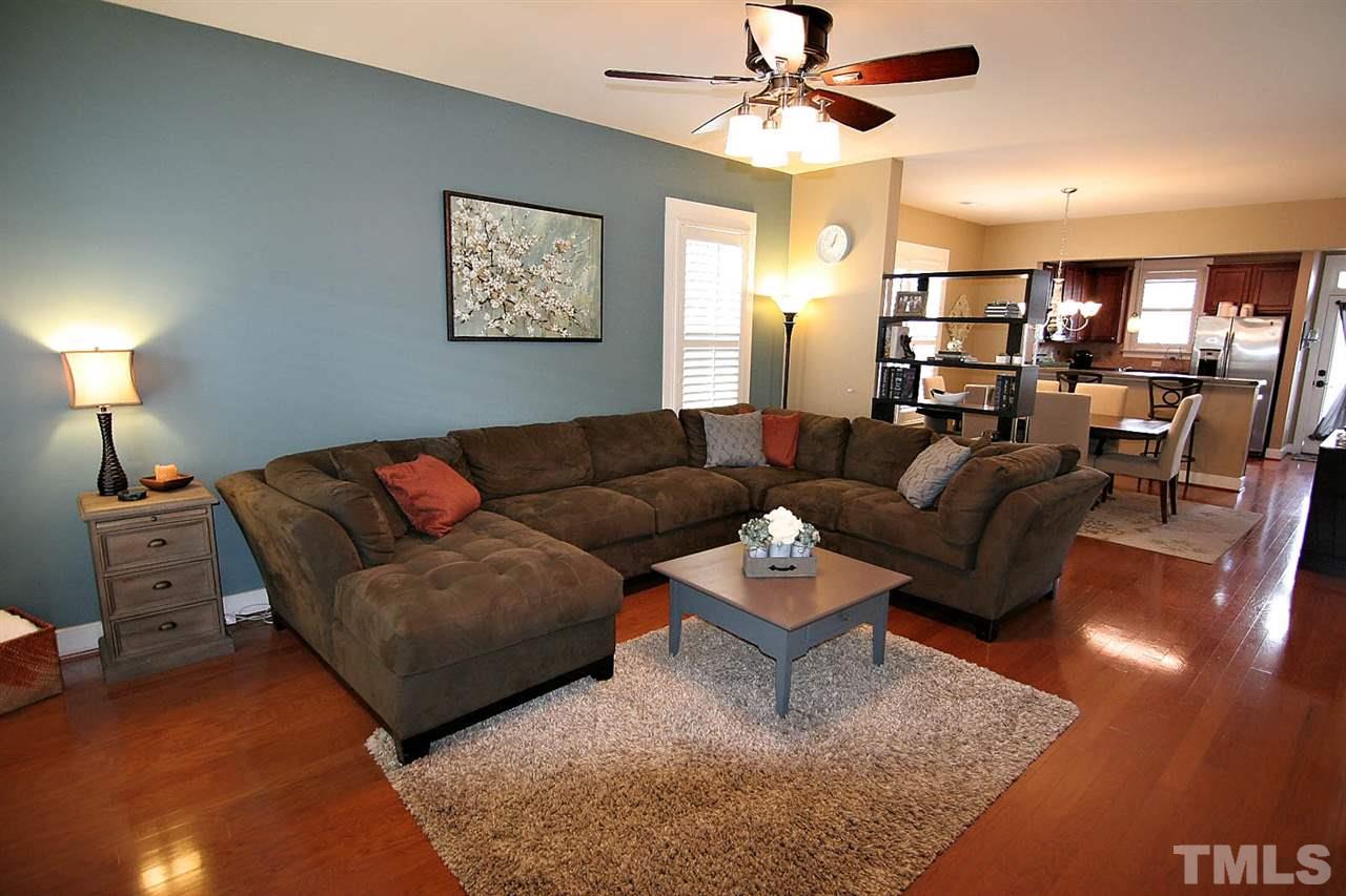 2248 Dunlin Lane Raleigh, NC 27614 - Photo 4 of 24 a living room with furniture and a lamp