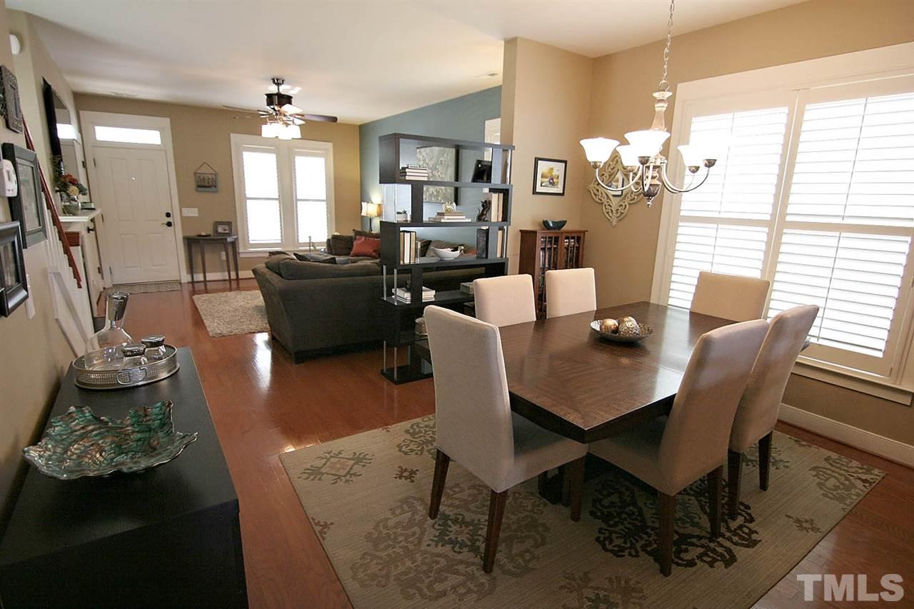 2248 Dunlin Lane Raleigh, NC 27614 - Photo 7 of 24 a view of a dining room with furniture and chandelier