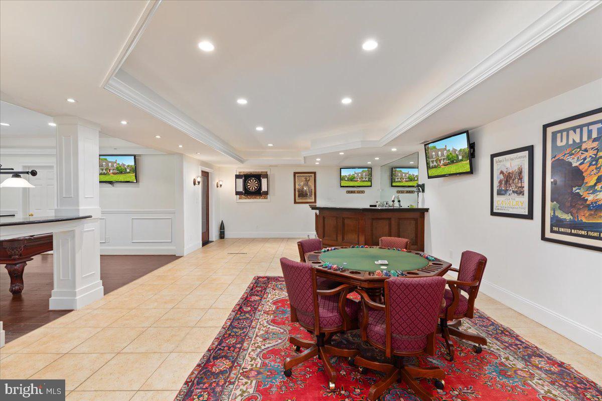 14915 Alpine Bay Loop Gainesville, VA 20155 - Photo 64 of 105 a view of a dining room with furniture