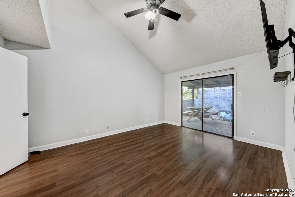 15010 Spring Shower San Antonio, TX 78247 - Photo 15 of 27 wooden floor in an empty room with a window