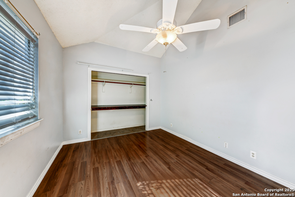 15010 Spring Shower San Antonio, TX 78247 - Photo 20 of 27 wooden floor in an empty room with a window