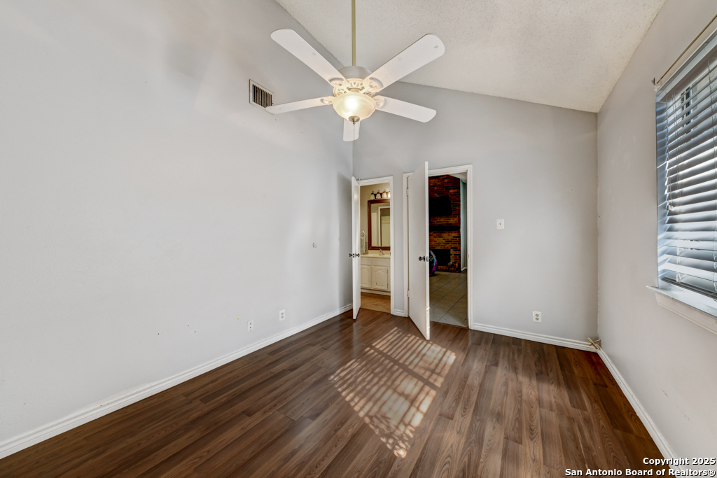 15010 Spring Shower San Antonio, TX 78247 - Photo 21 of 27 wooden floor in an empty room with a window