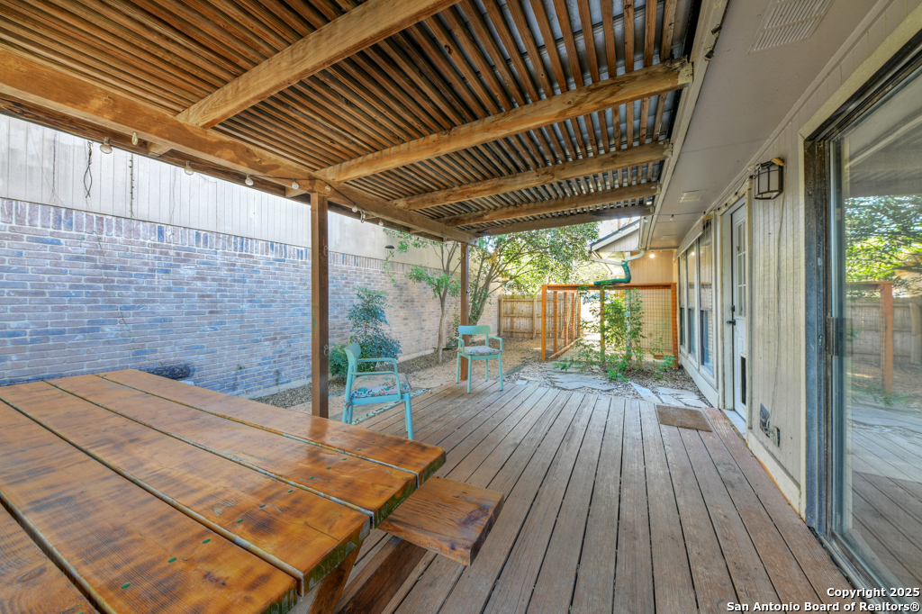 15010 Spring Shower San Antonio, TX 78247 - Photo 24 of 27 a porch with seating space