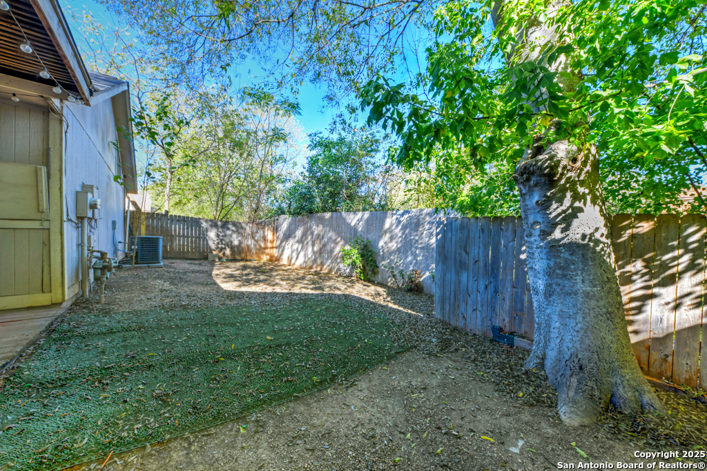 15010 Spring Shower San Antonio, TX 78247 - Photo 26 of 27 a view of a back yard