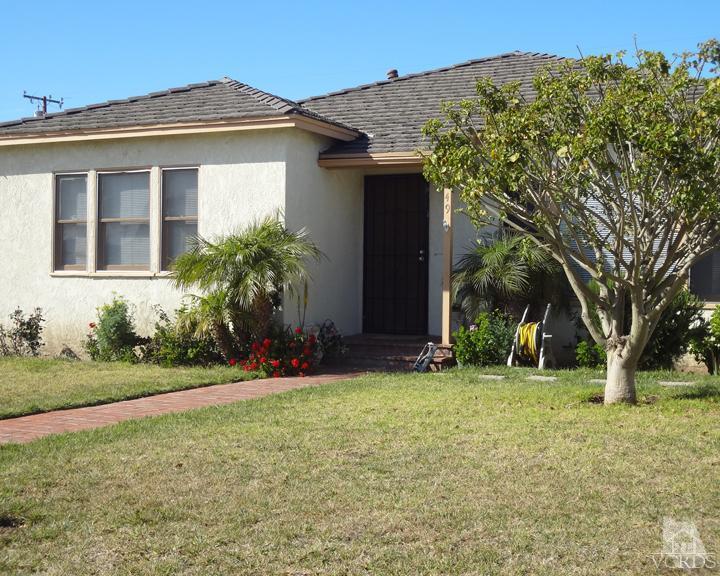 249 West Roderick Avenue Oxnard, CA 93030 - Photo 1 of 1 a front view of a house with a yard