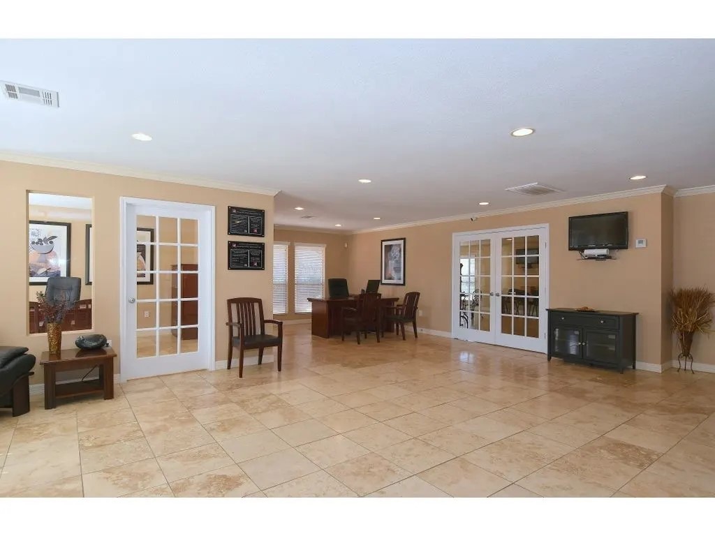 17310 Kieth Harrow Boulevard, Unit 214 Houston, TX 77084 - Photo 2 of 20 a living room with furniture