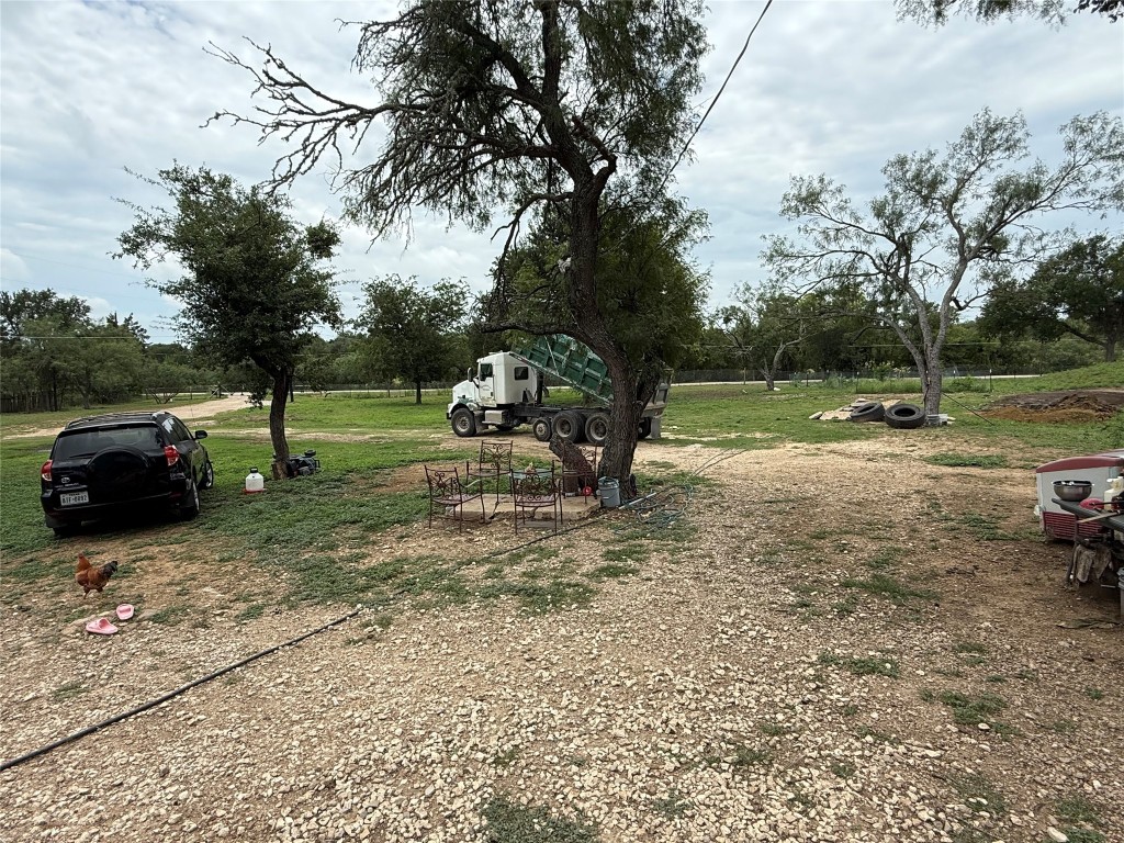 968 Red Town Road Elgin, TX 78621 - Photo 19 of 36 View of green lawn